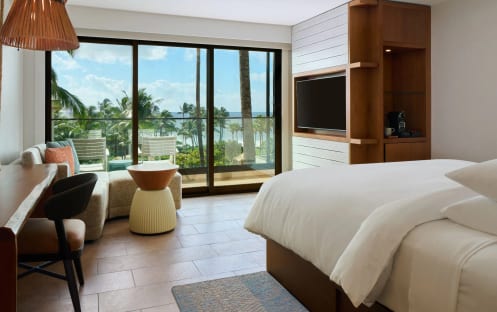 1 King Bed or 2 Queen Beds Partial Ocean View